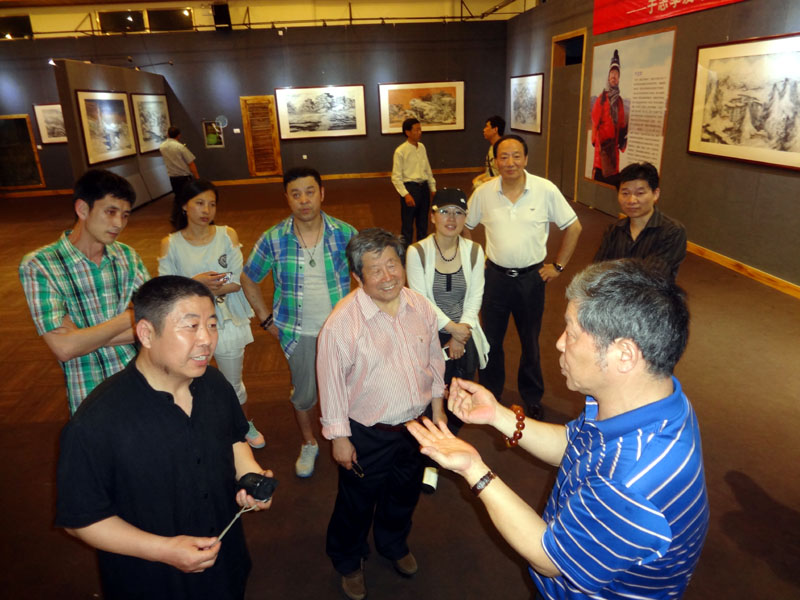 河山画会副会长詹志峰与冰雪画派交流